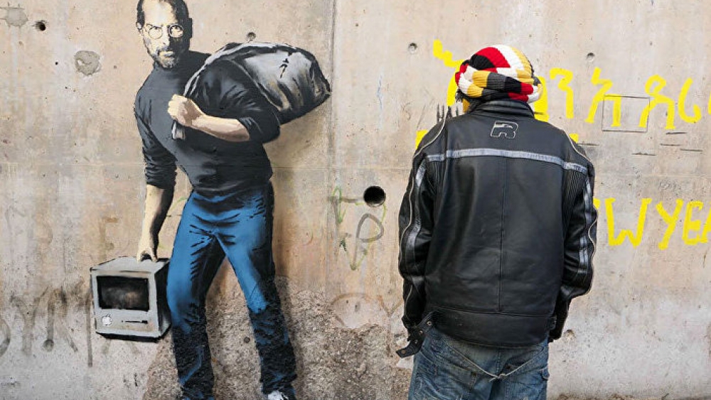 Banksy, 'Suriyeli göçmen' Steve Jobs'u çizdi
